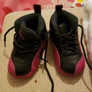 Black and pink Jordan's